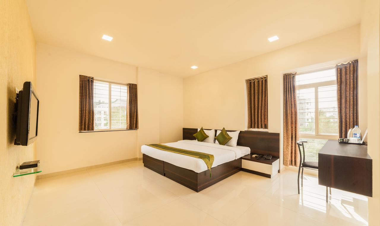 Hotel Treebo Trend Abode Nashik Exterior foto